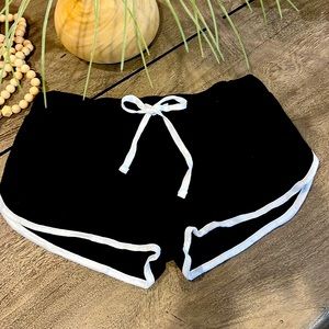 Black with white trim dolphin hem shorts